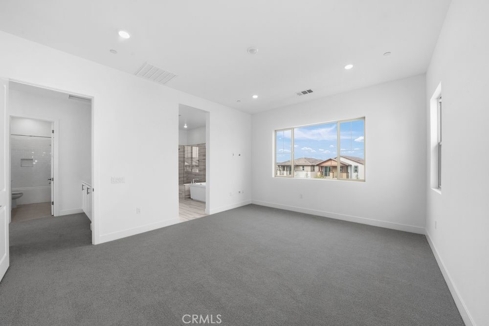 118 Pansy Irvine, CA 92618 - Photo 14 of 46 an empty room with entrance and windows