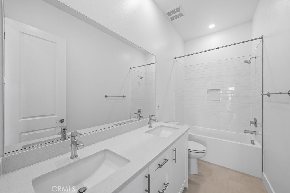 118 Pansy Irvine, CA 92618 - Photo 32 of 46 a bathroom with a sink a toilet and shower