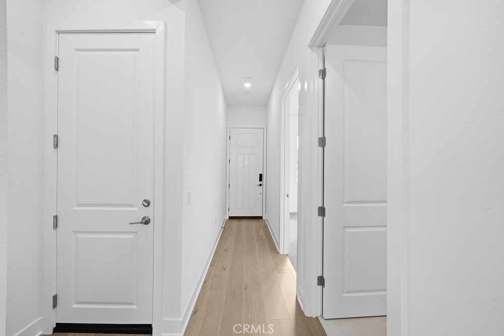 118 Pansy Irvine, CA 92618 - Photo 34 of 46 a view of a hallway with wooden floor