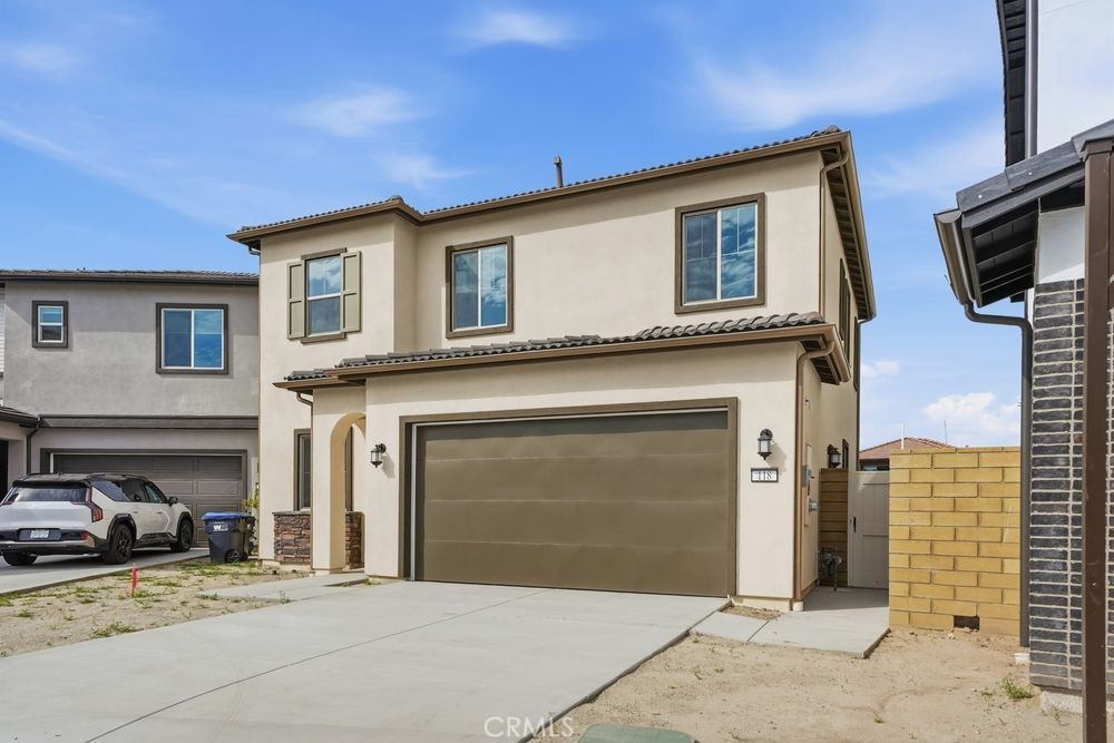 118 Pansy Irvine, CA 92618 - Photo 41 of 46 a front view of a house with a garage
