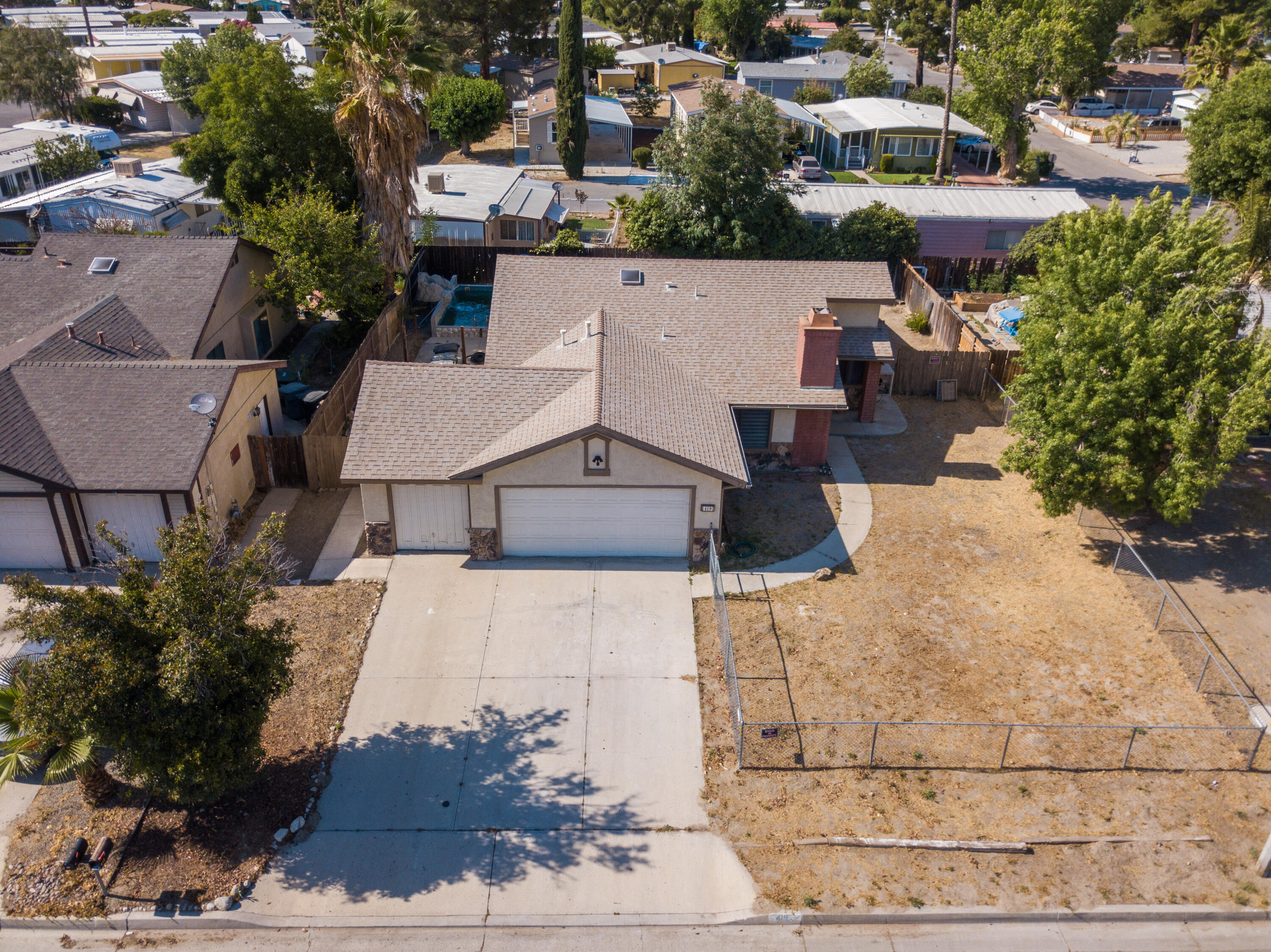419 Quandt Ranch Road San Jacinto, CA 92583 - Photo 2 of 40 an aerial view of a house with garden space and street view