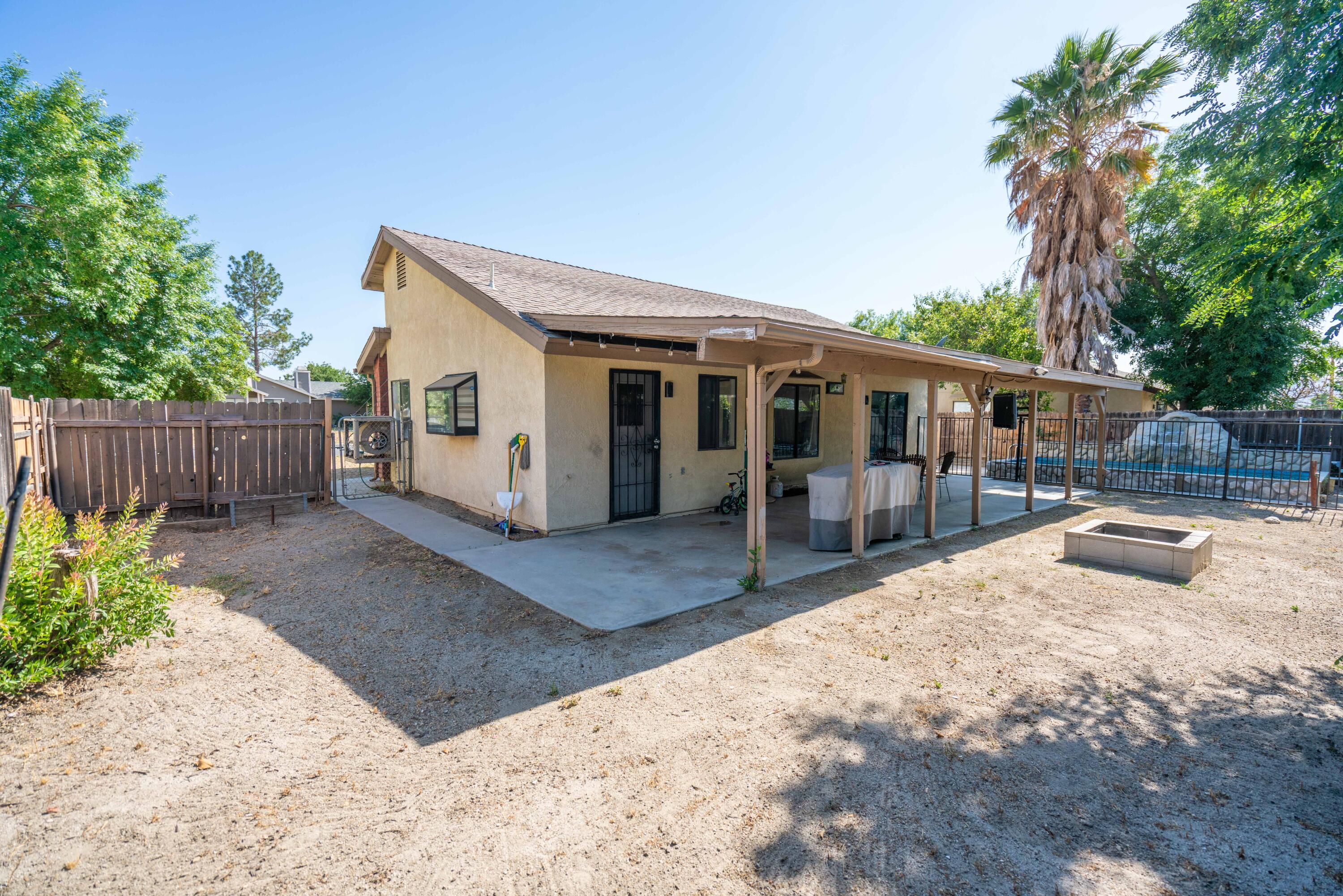 419 Quandt Ranch Road San Jacinto, CA 92583 - Photo 31 of 40 a view of a house with backyard and sitting area