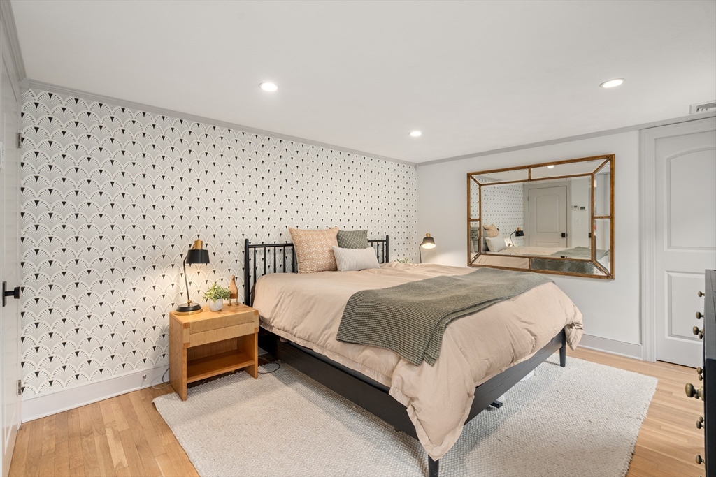57 Marlboro Road Sudbury, MA 01776 - Photo 16 of 40 a bedroom with a bed and a view of bathroom
