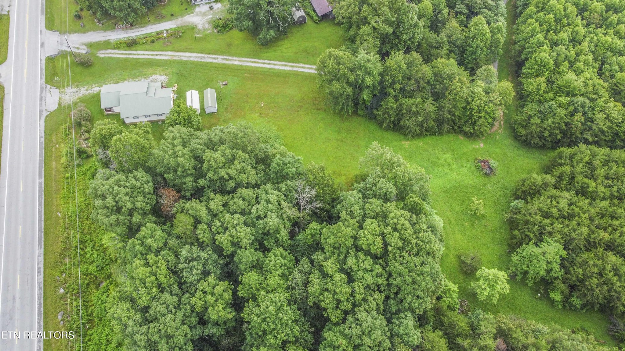 11981 South S Highway Crossville, TN 38572 - Photo 36 of 49 a view of a lake with a yard