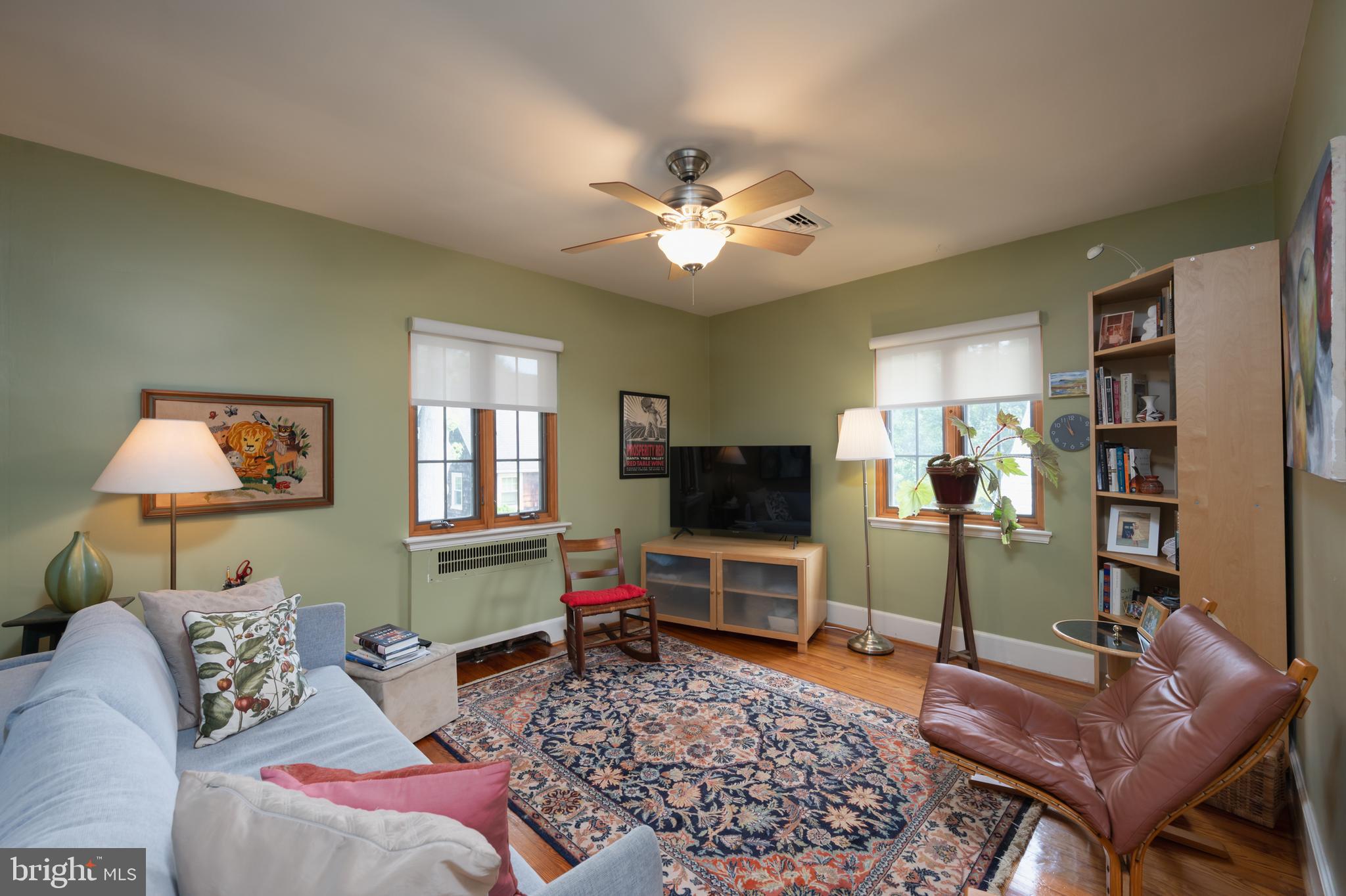 409 East Waverly Road Wyncote, PA 19095 - Photo 21 of 36 a living room with furniture and a flat screen tv
