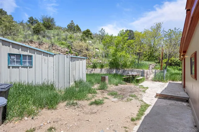 a view of a lake with a garden