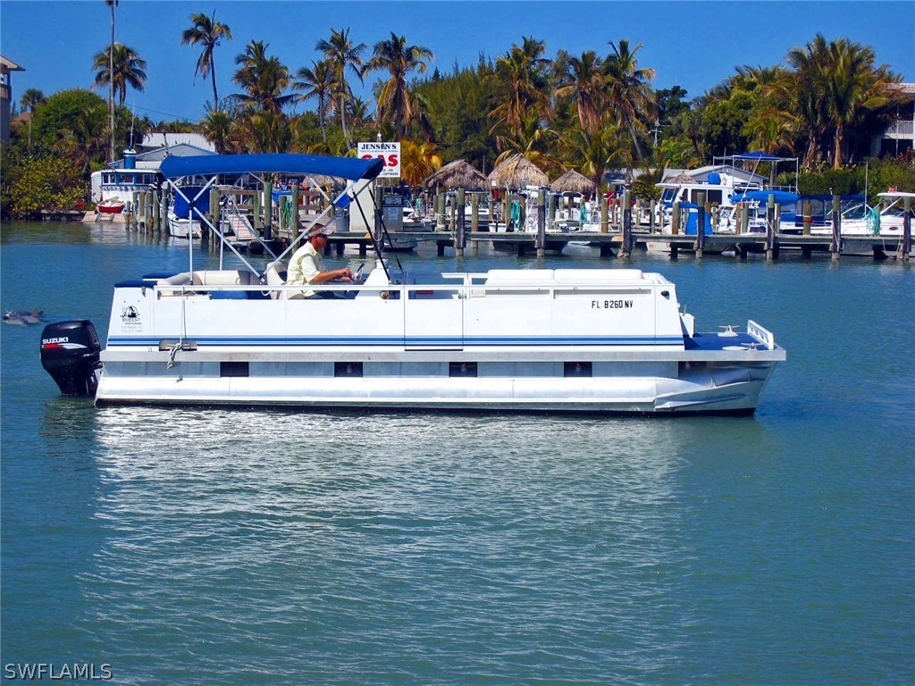 15107 Captiva Drive Captiva, FL 33924 - Photo 17 of 35 a view of a lake with houses