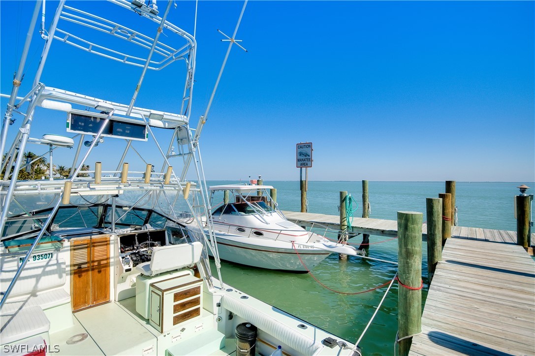 15107 Captiva Drive Captiva, FL 33924 - Photo 19 of 35 a couple of boats are docked in a patio