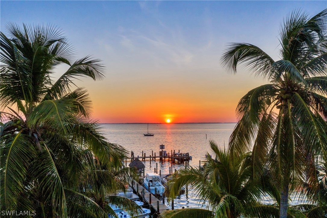 15107 Captiva Drive Captiva, FL 33924 - Photo 30 of 35 a view of a palm trees in front of a building