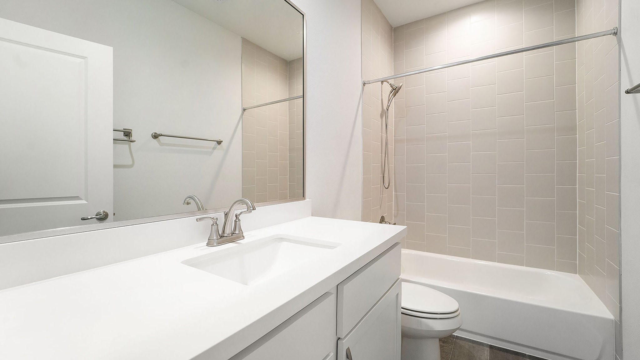 9573 Neuens Road, Unit A Houston, TX 77080 - Photo 17 of 22 a bathroom with a sink toilet and shower