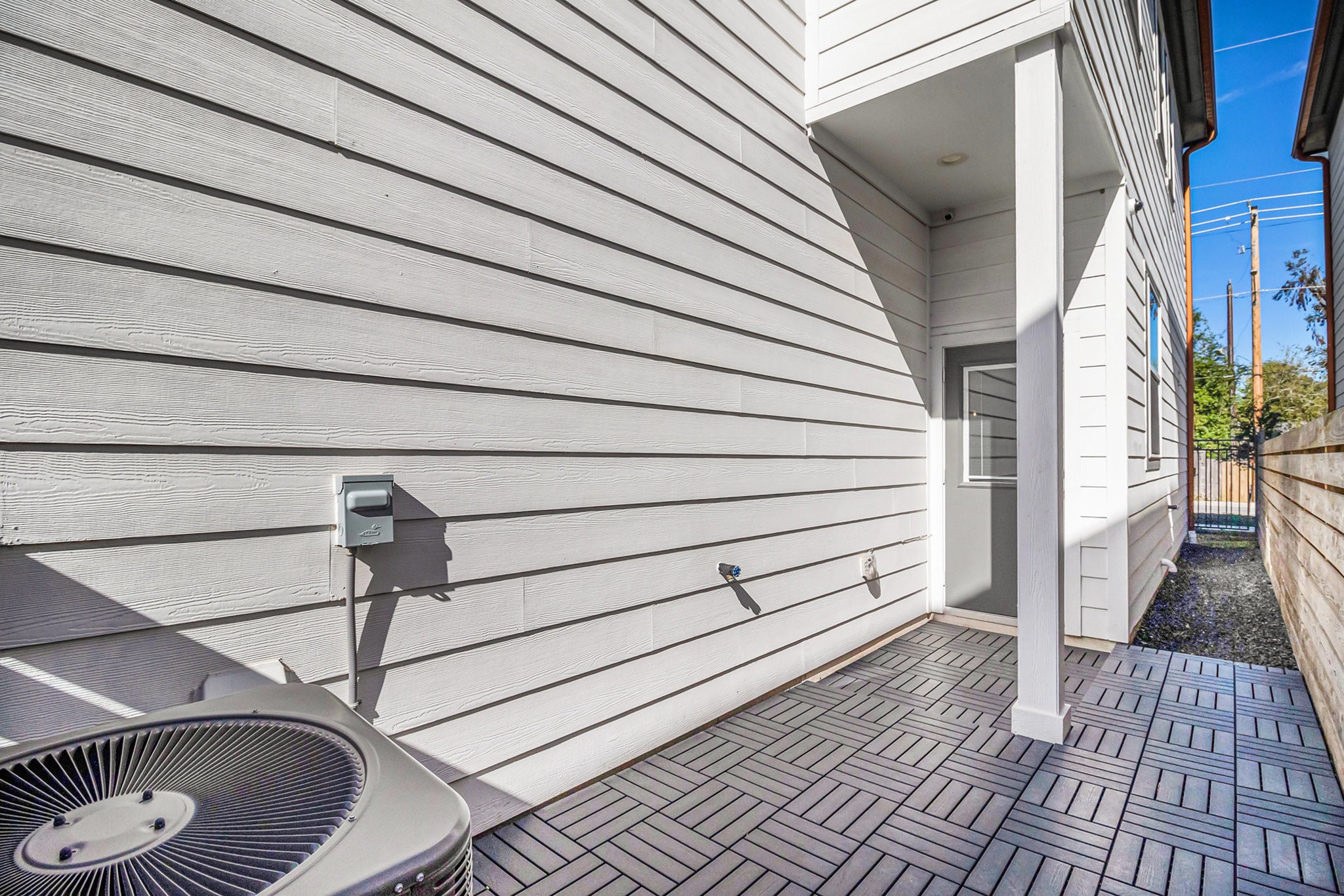 9573 Neuens Road, Unit A Houston, TX 77080 - Photo 21 of 22 a view of a balcony with wooden floor