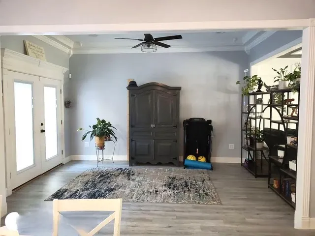 a living room with wooden floor