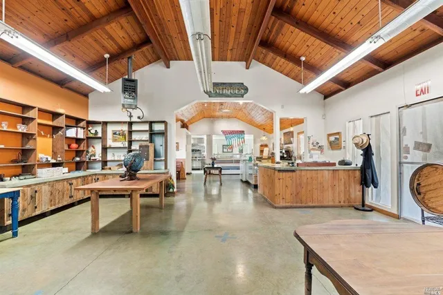 a large room with lots of wooden furniture