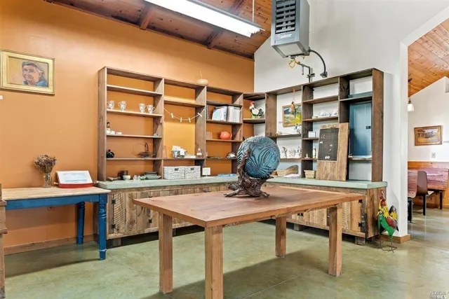 a view of a workspace with furniture