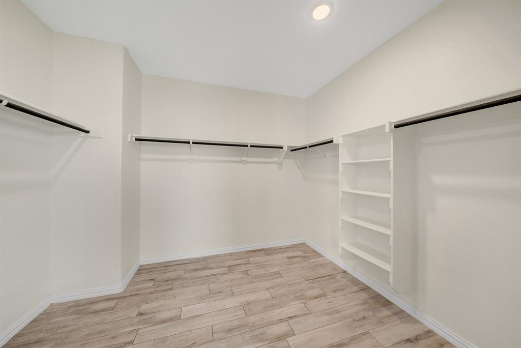 107 Red Clf Court Rhome, TX 76078 - Photo 23 of 34 Large primary closet.