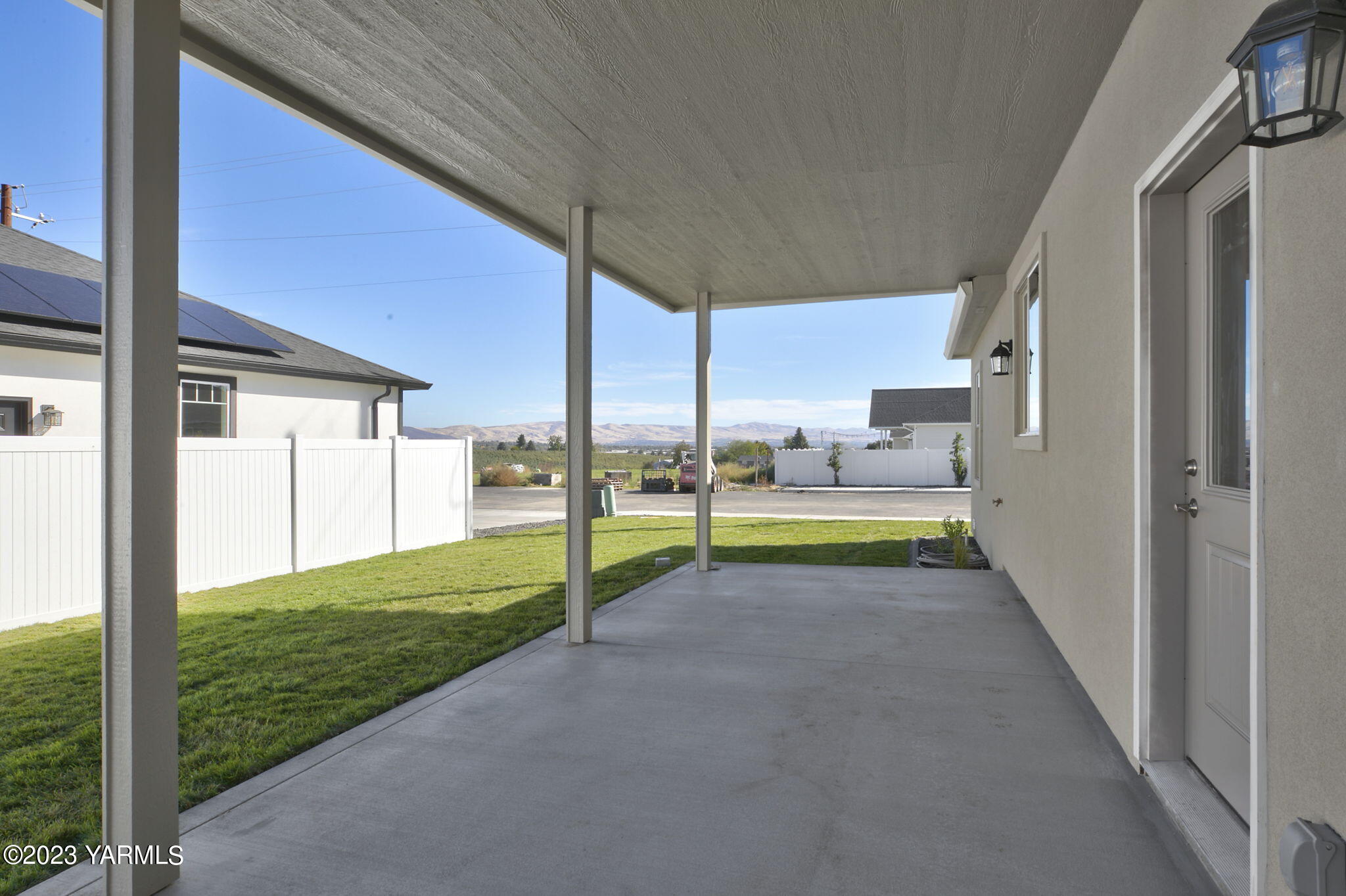 7201 Vista Ridge Avenue Yakima, WA 98903 - Photo 3 of 25 a view of a house with backyard and porch
