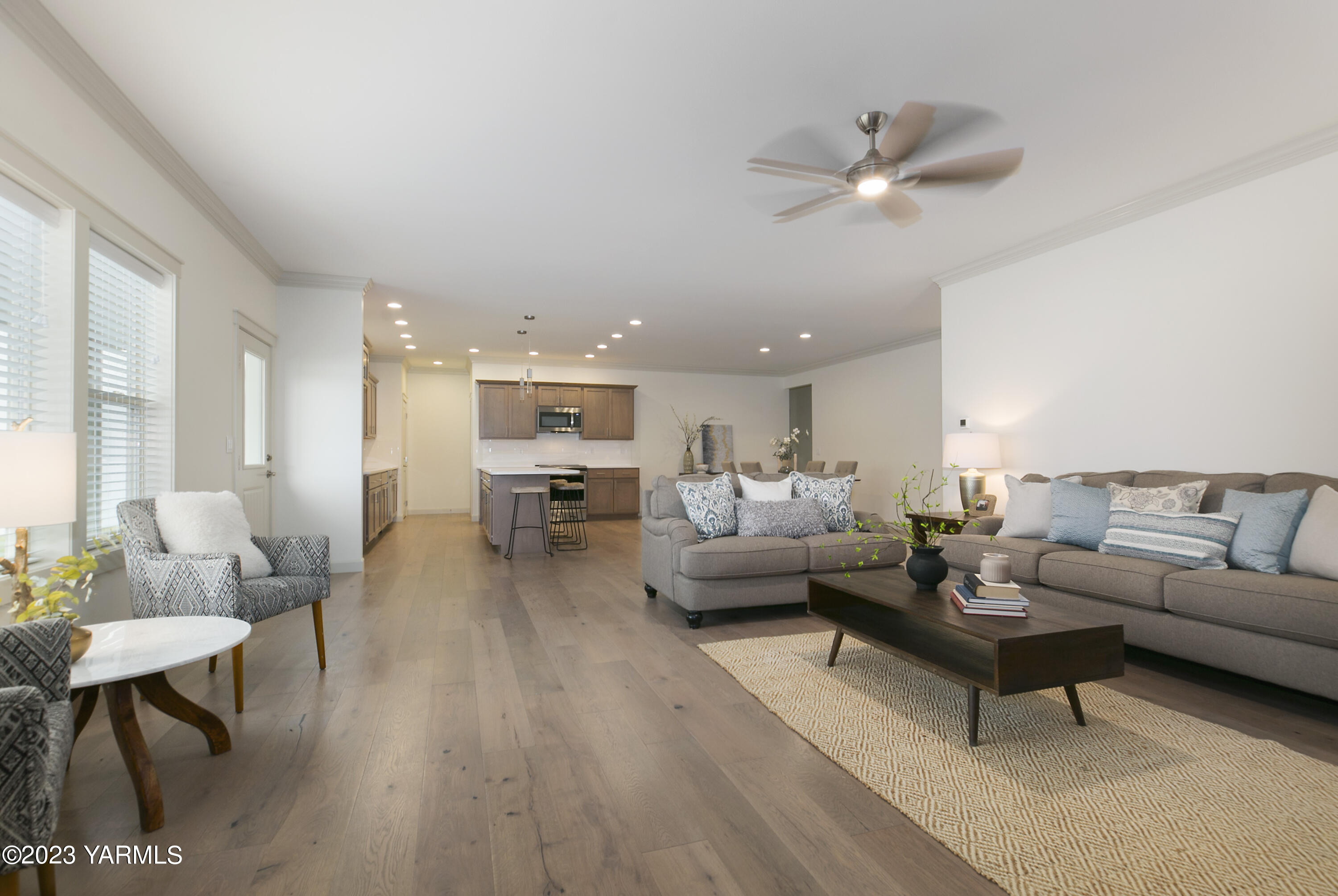7201 Vista Ridge Avenue Yakima, WA 98903 - Photo 8 of 25 a living room with furniture and a wooden floor