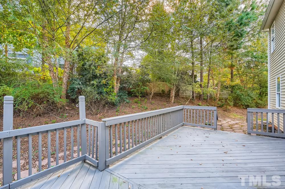 109 Oakbeech Court Holly Springs, NC 27540 - Photo 25 of 28 a view of deck and yard with wooden fence