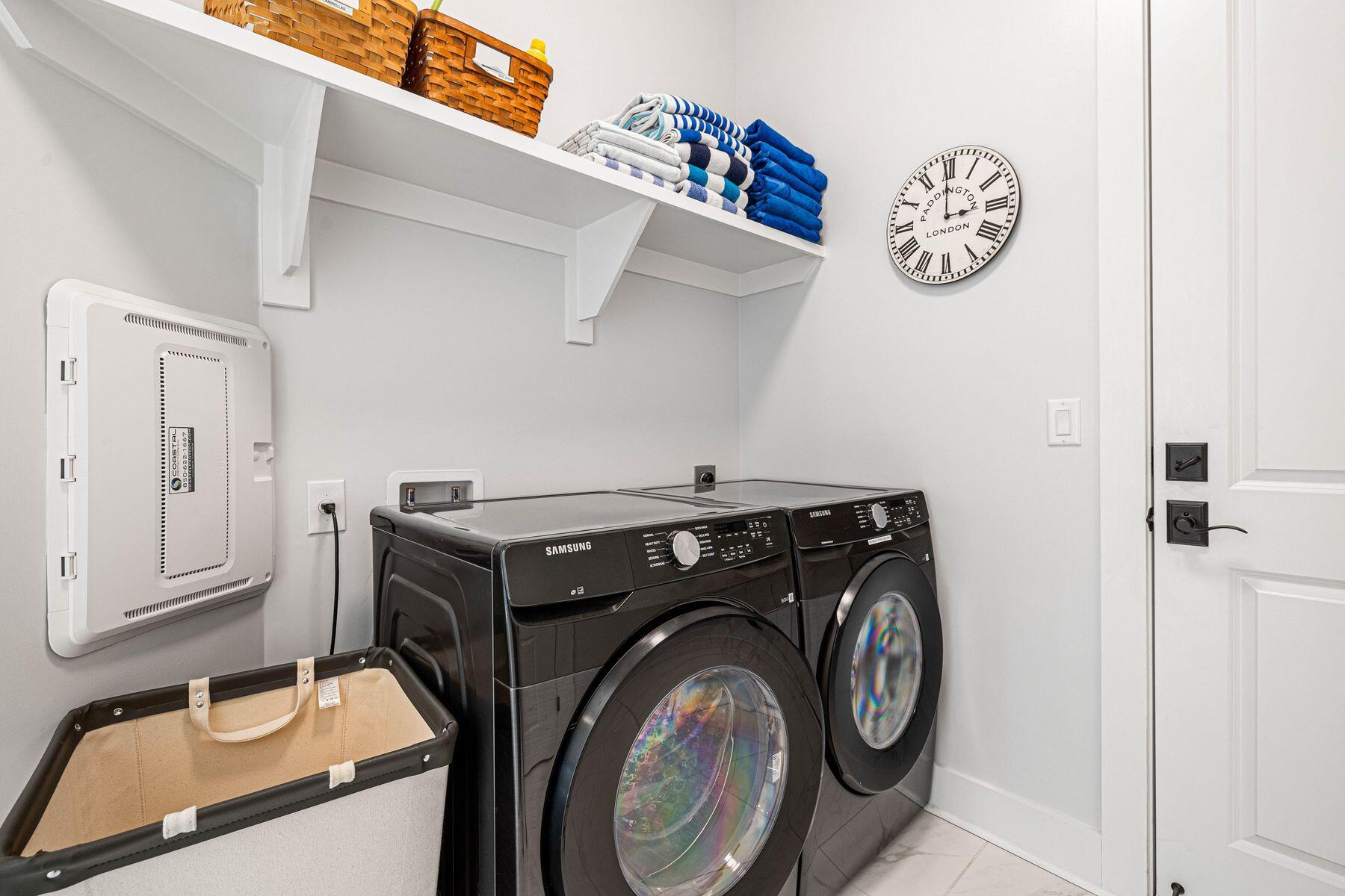 94 Ravine Road Watersound, FL 32461 - Photo 19 of 35 a utility room with dryer and washer