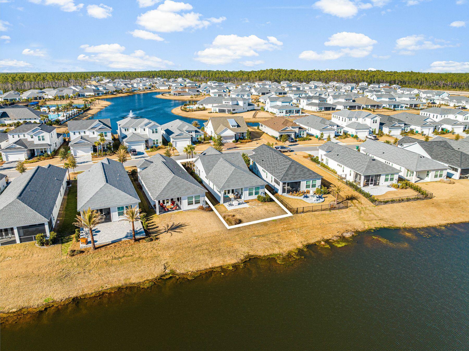 94 Ravine Road Watersound, FL 32461 - Photo 34 of 35 an aerial view of residential houses with outdoor space