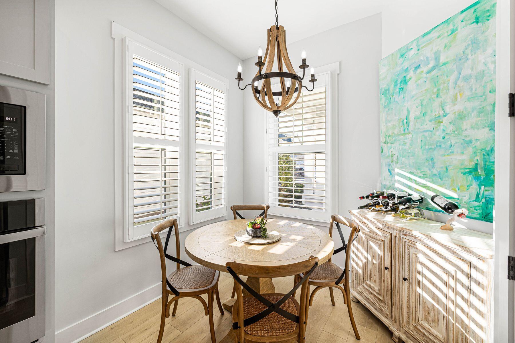 94 Ravine Road Watersound, FL 32461 - Photo 6 of 35 a table room with a table and chairs in it