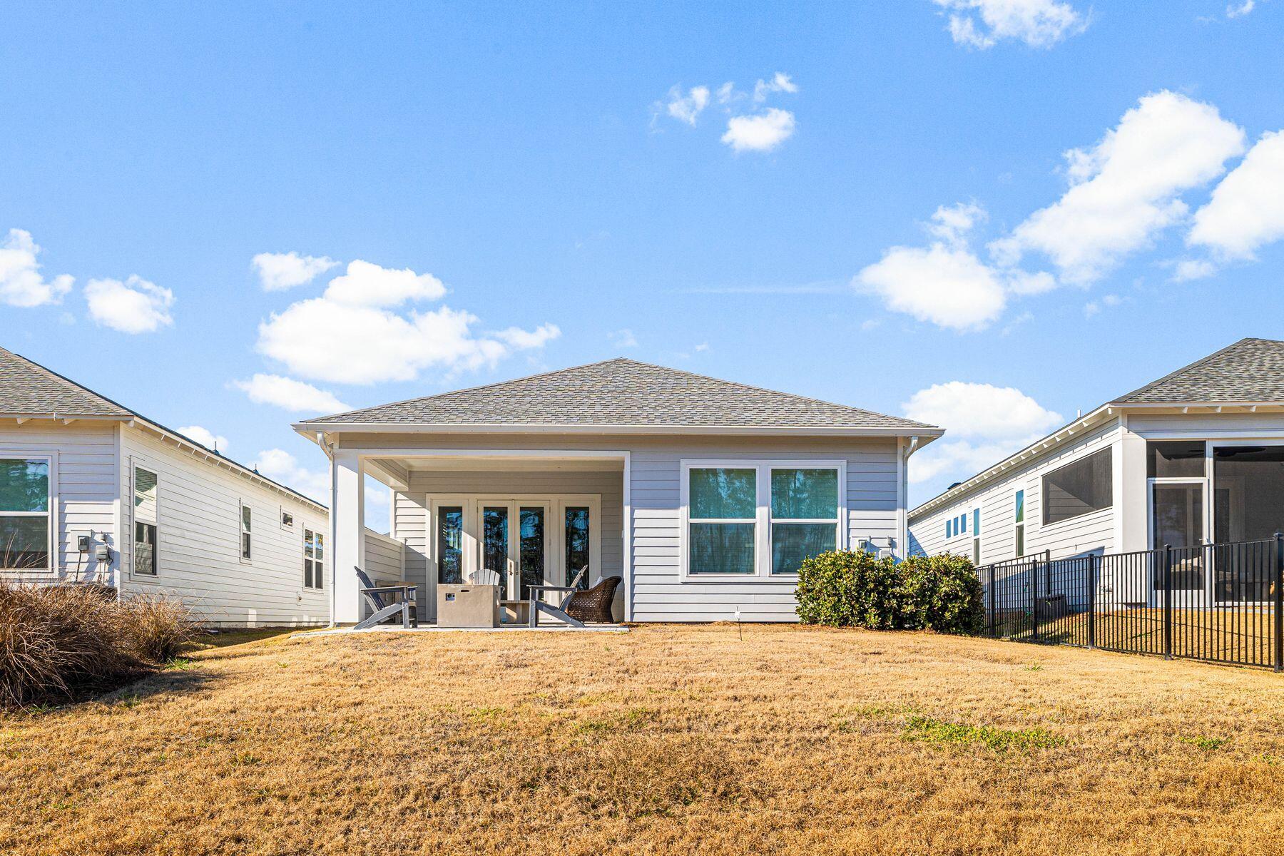 94 Ravine Road Watersound, FL 32461 - Photo 8 of 35 a view of a house with a patio
