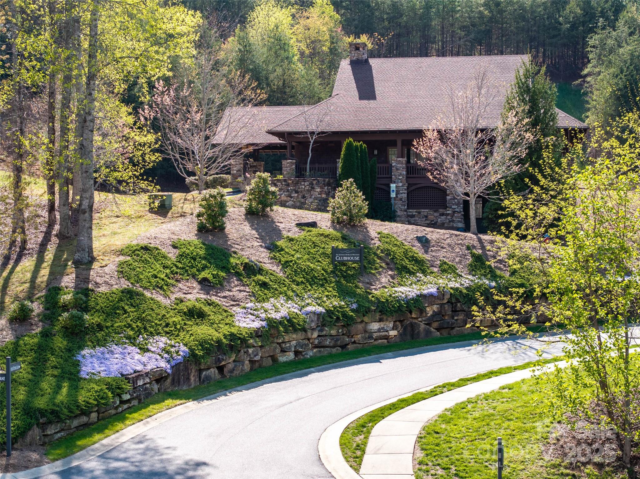 63 Old Lafayette Lane Black Mountain, NC 28711 - Photo 9 of 10 a view of a house with swimming pool and garden