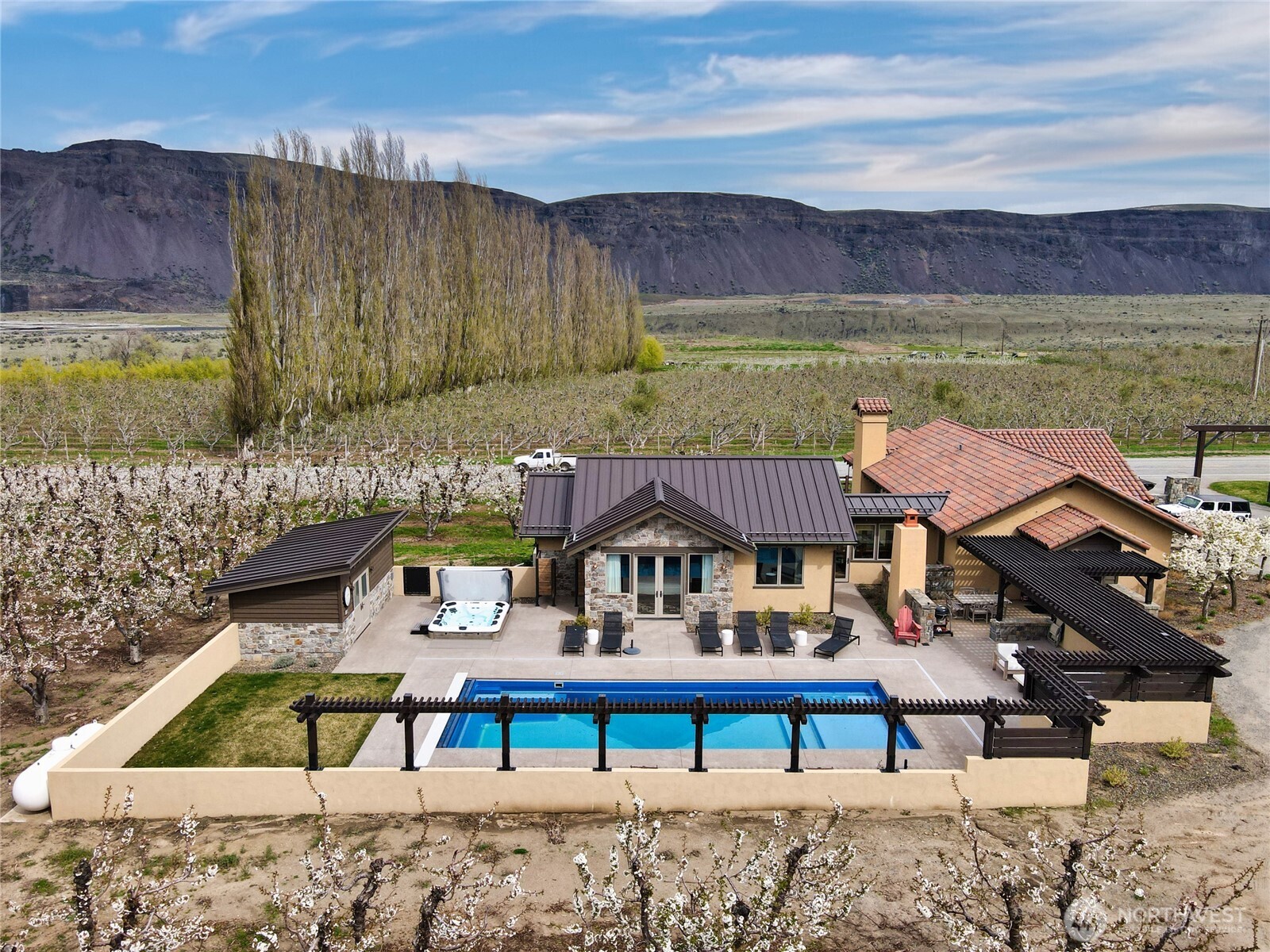 5814 Colockum Road Malaga, WA 98828 - Photo 1 of 40 a view of house with outdoor space and seating area