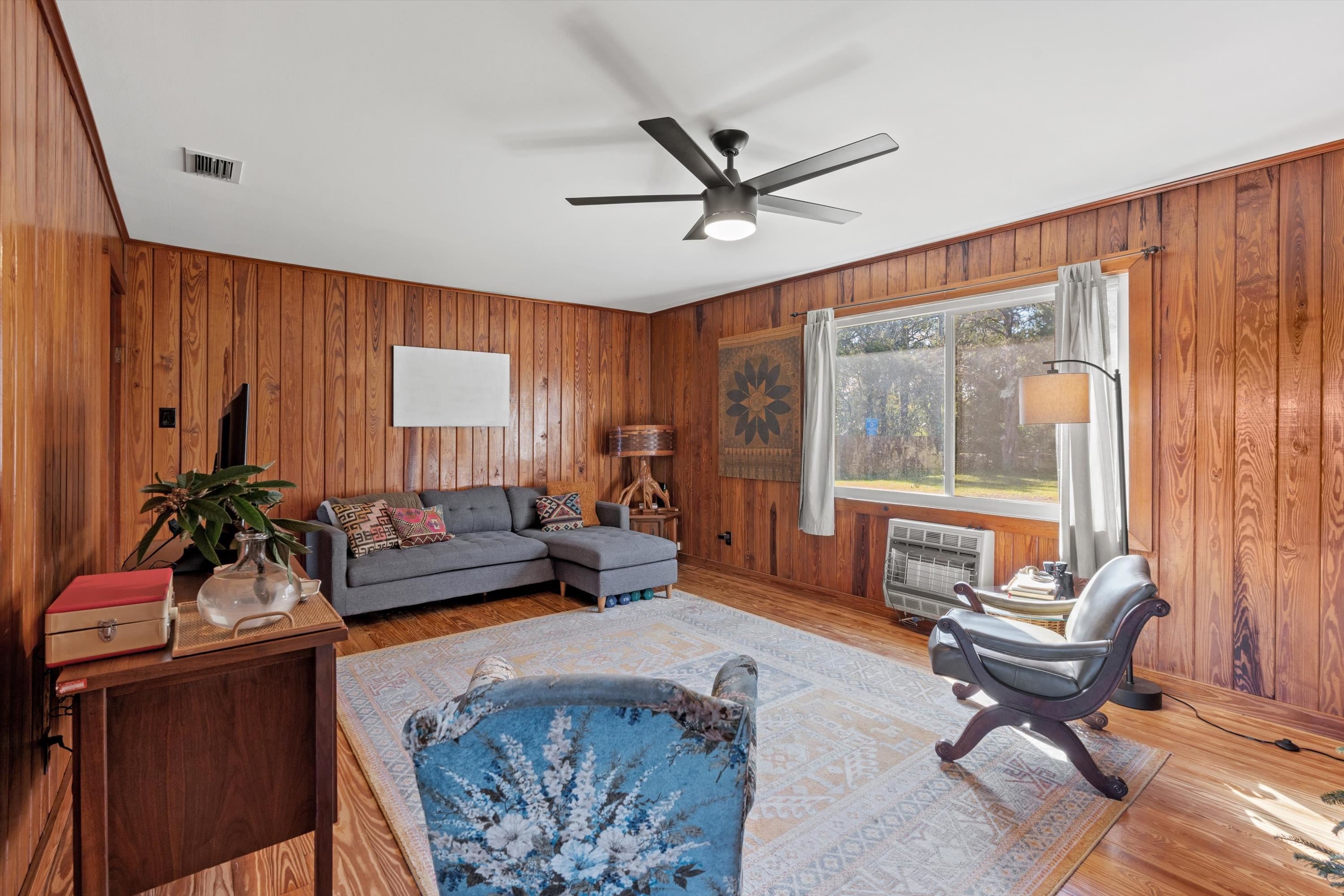 1065 South Whitney Street St. Augustine, FL 32084 - Photo 11 of 25 a living room with furniture and a large window