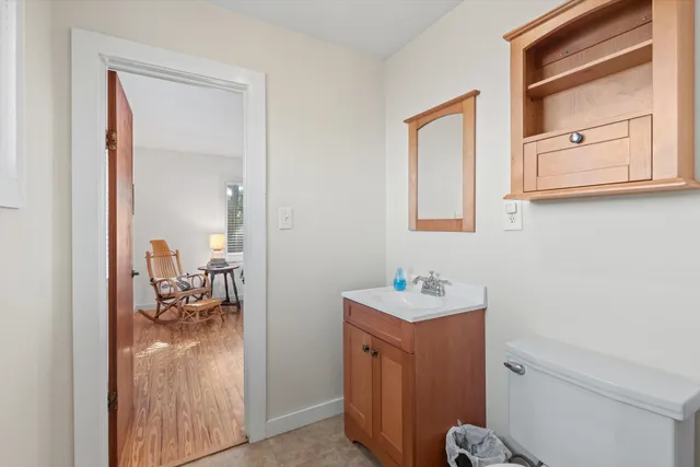 a en suite bathroom with a sink a mirror and a shower