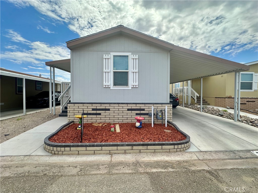 a view of a house with a patio