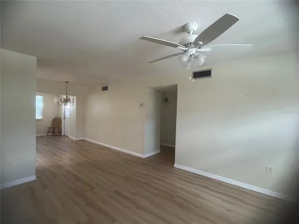 a kitchen with a stove and a refrigerator