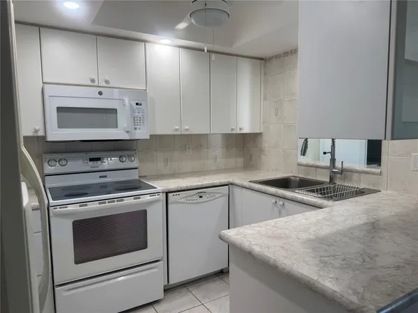 a view of kitchen with a sink