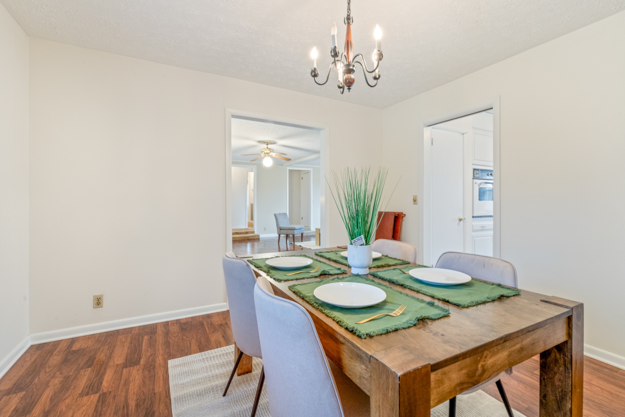 2054 Ridgecrest Circle Dickson, TN 37055 - Photo 12 of 38 a view of a dining room with furniture and wooden floor