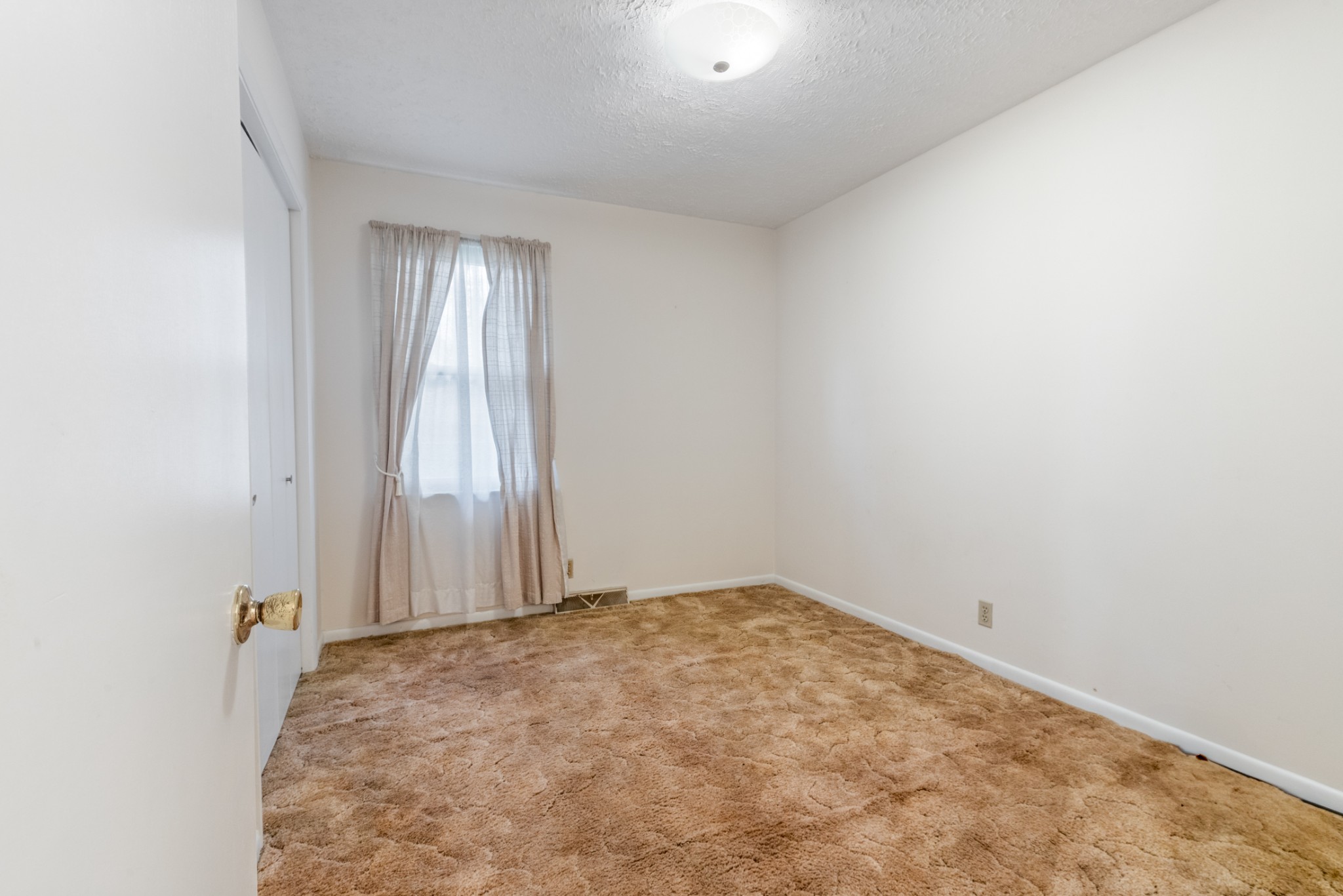 2054 Ridgecrest Circle Dickson, TN 37055 - Photo 22 of 38 an empty room with windows