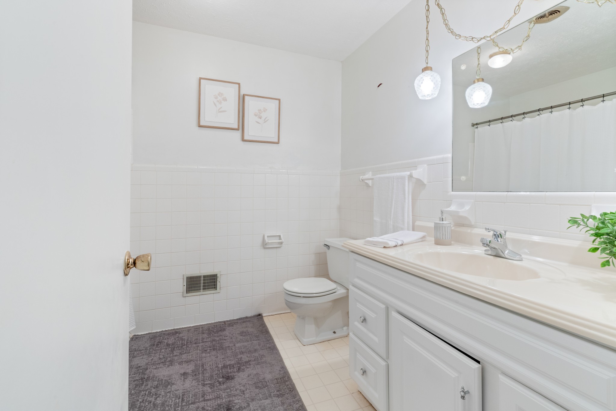 2054 Ridgecrest Circle Dickson, TN 37055 - Photo 24 of 38 a bathroom with a granite countertop sink a toilet and a mirror