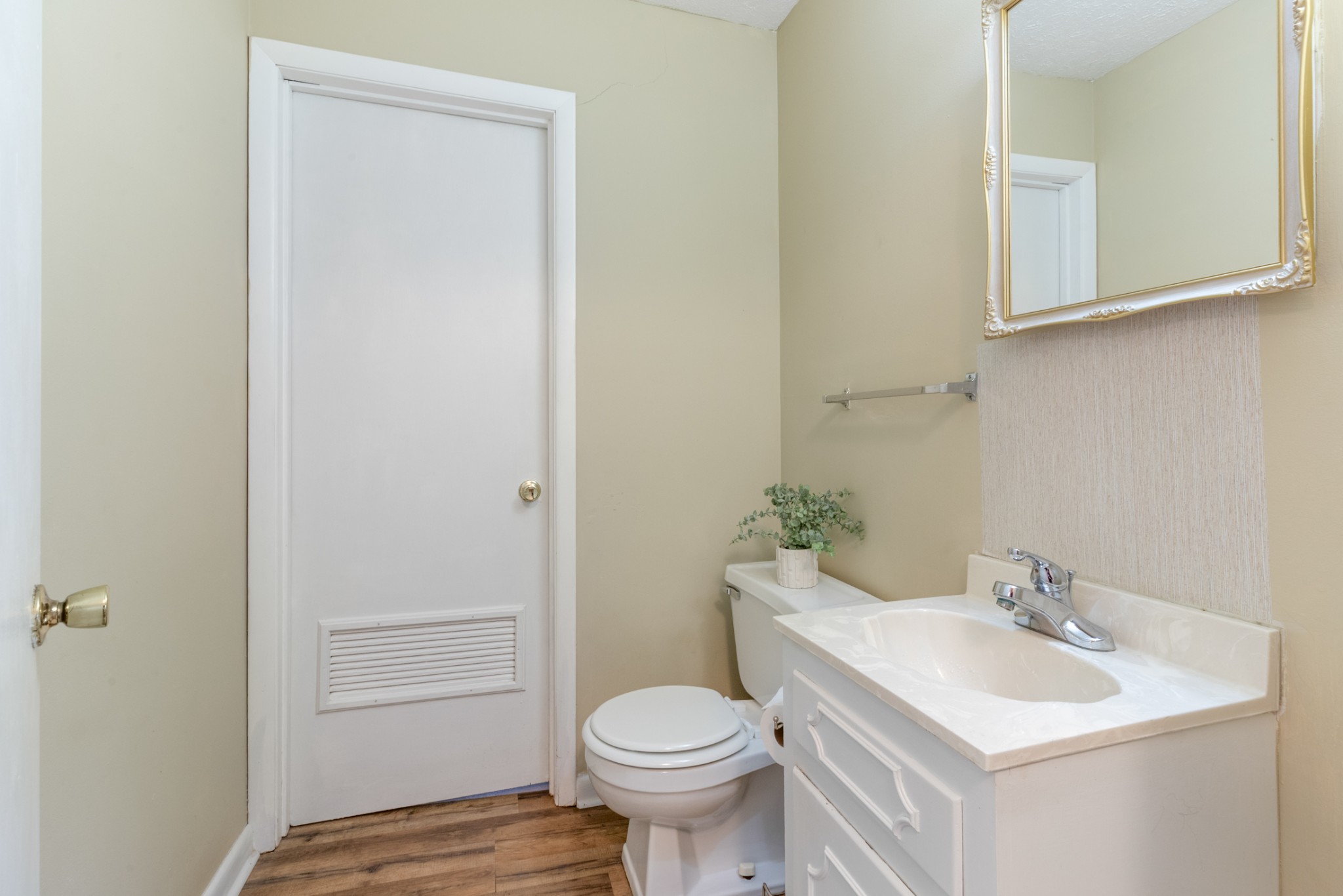 2054 Ridgecrest Circle Dickson, TN 37055 - Photo 28 of 38 a bathroom with a sink toilet and a mirror