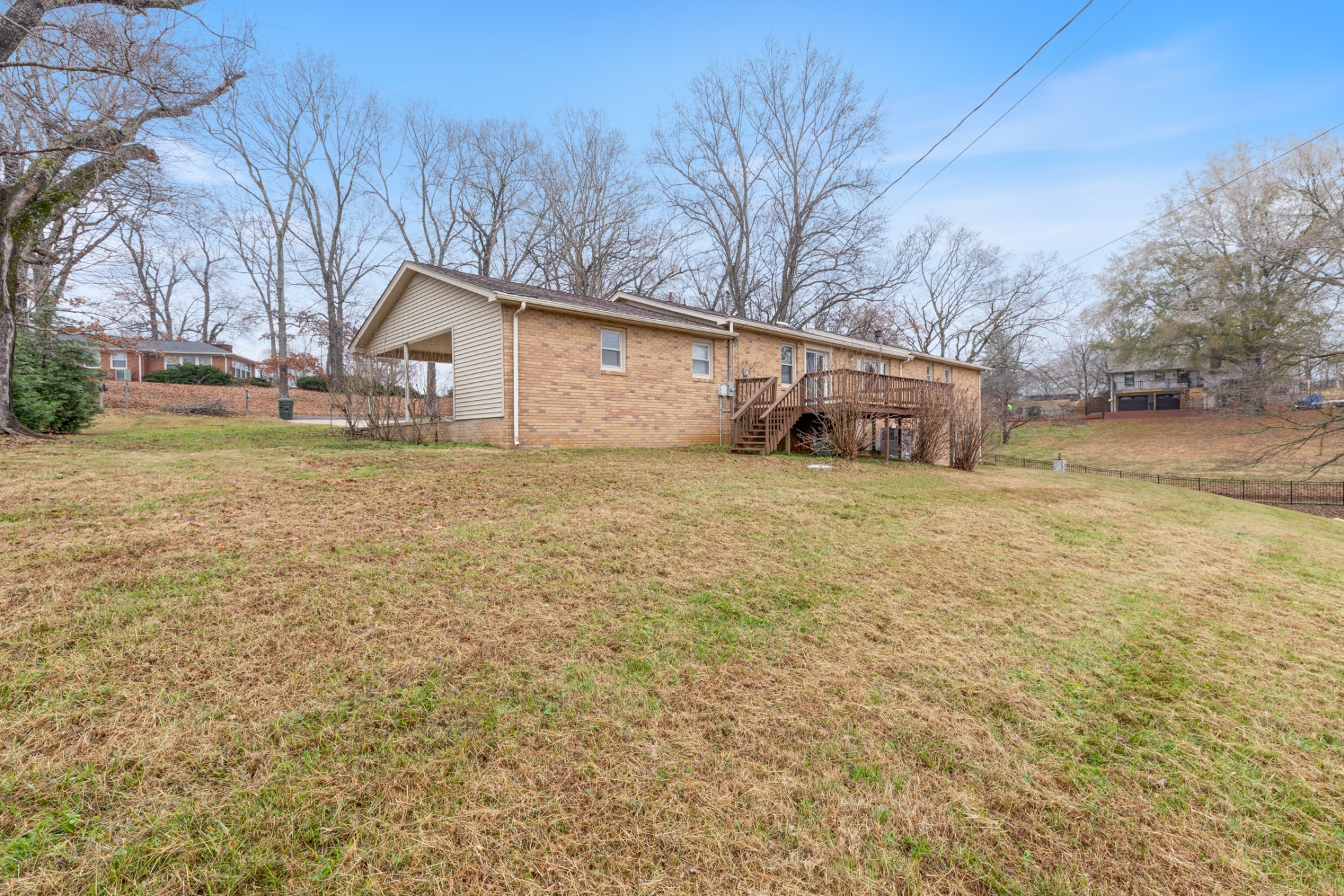 2054 Ridgecrest Circle Dickson, TN 37055 - Photo 35 of 38 a view of a house with a yard covered with snow and trees