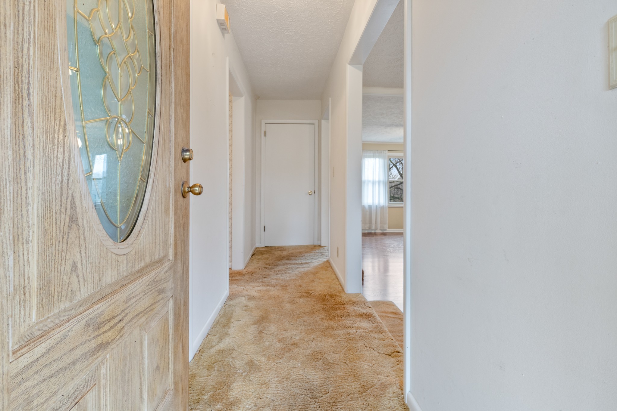 2054 Ridgecrest Circle Dickson, TN 37055 - Photo 6 of 38 a view of a hallway with wooden floor and staircase