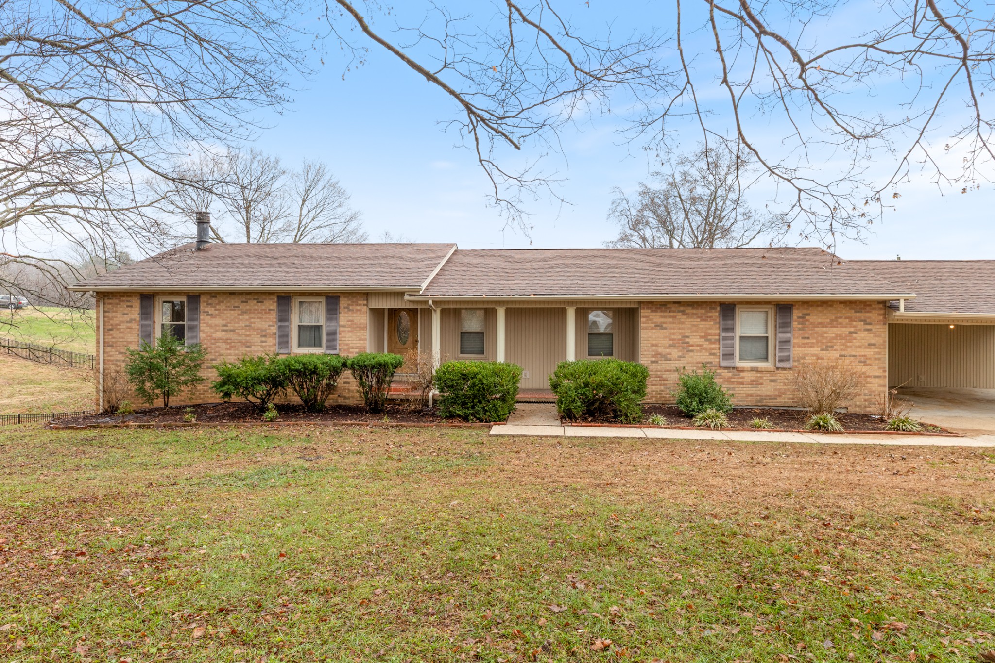 2054 Ridgecrest Circle Dickson, TN 37055 - Photo 7 of 38 a front view of a house with garden