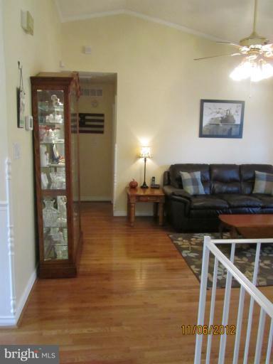 71 Haverhill Road Joppa, MD 21085 - Photo 3 of 30 a living room with furniture and a flat screen tv