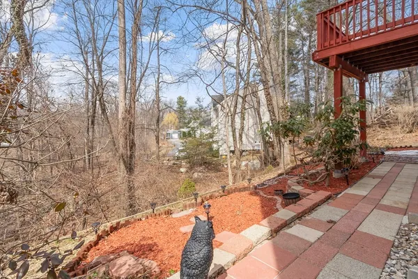 a view of a yard covered with snow in the background