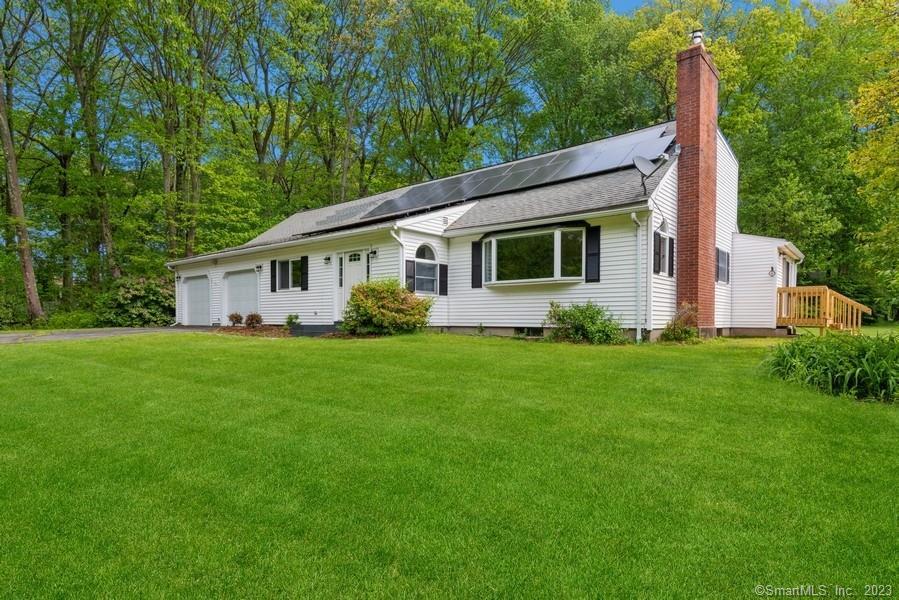200 Hebron Road Bolton, CT 06043 - Photo 1 of 1 a view of a house with backyard