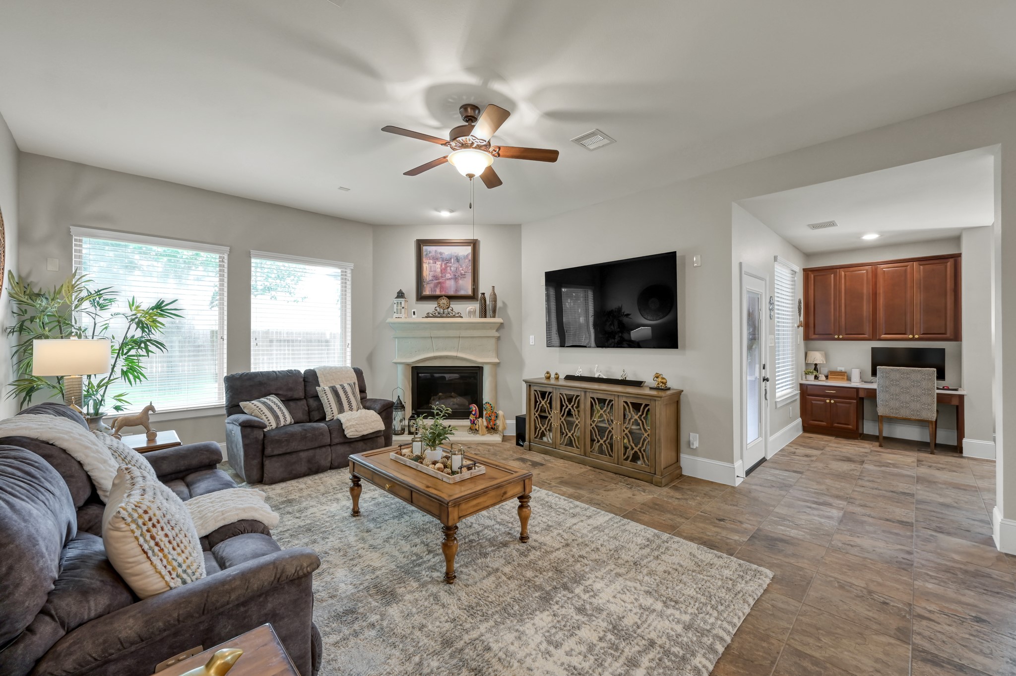 31742 Serrano Bluff Lane Spring, TX 77386 - Photo 9 of 40 Living room w/ cozy fireplace and natural light.