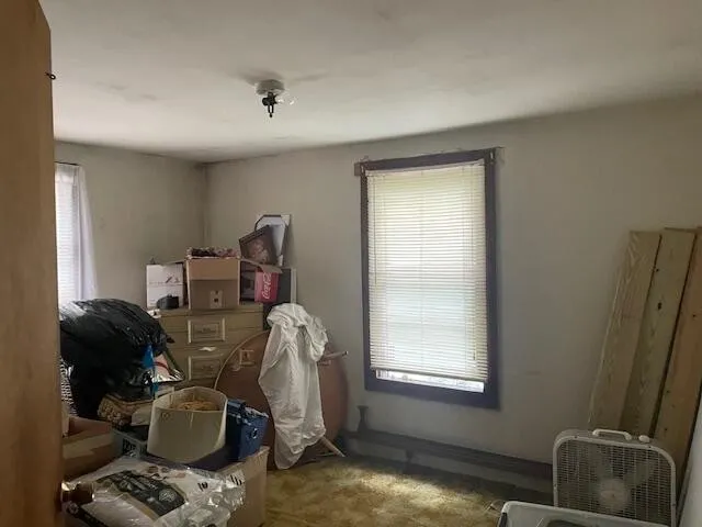 a bathroom with a sink and a window