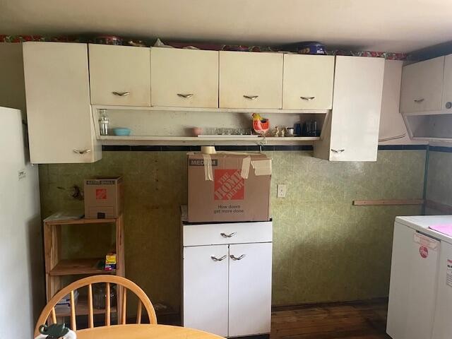 704 Annadel Road Lancing, TN 37770 - Photo 47 of 51 a kitchen with cabinets and appliances