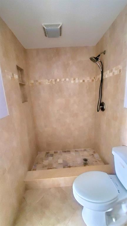 9731 West McNab Road, Unit 208 Fort Lauderdale, FL 33321 - Photo 21 of 31 a bathroom with a sink and a toilet