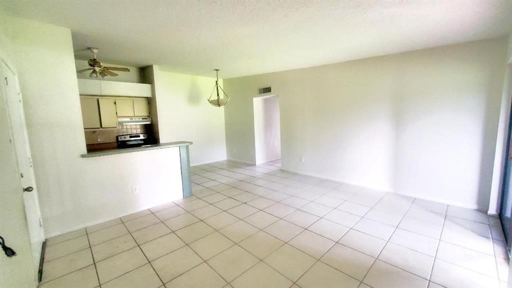 9731 West McNab Road, Unit 208 Fort Lauderdale, FL 33321 - Photo 28 of 31 a view of a storage & utility room in a house