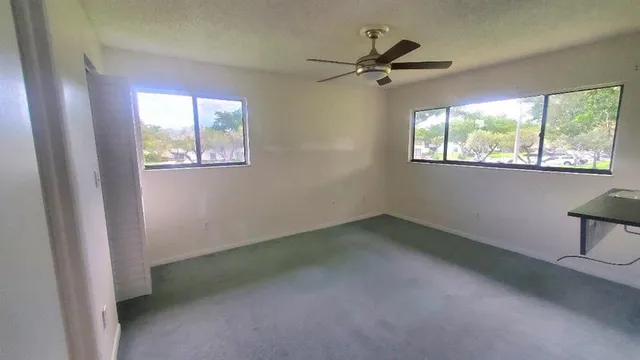 a view of a livingroom with a window