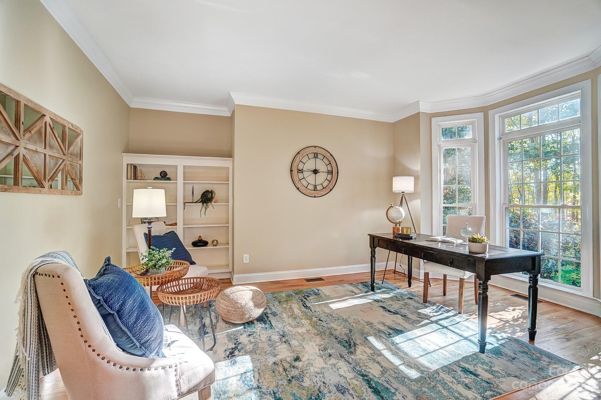9710 Shadowmere Lane Weddington, NC 28104 - Photo 19 of 46 a living room with furniture a rug and a window